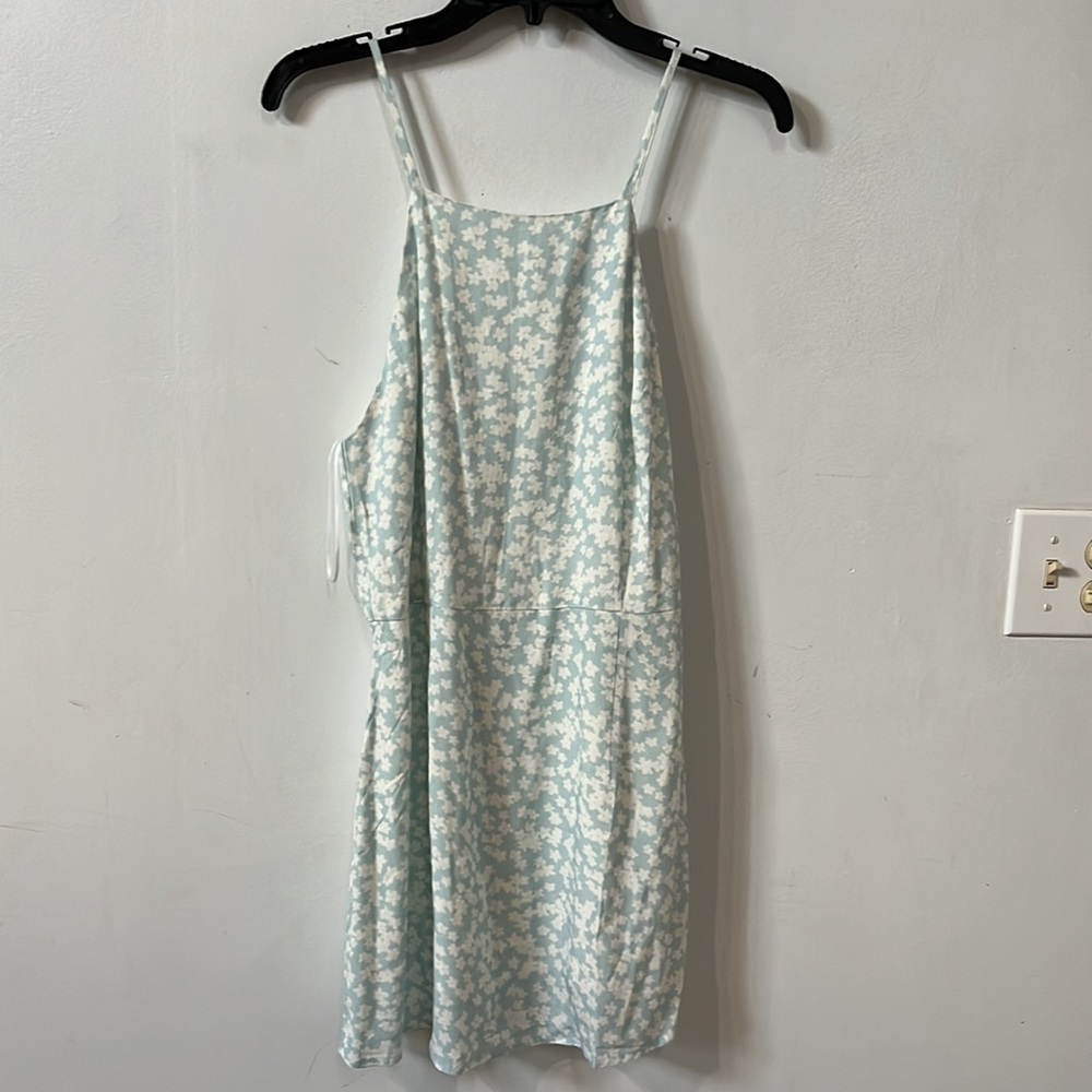 NWT spaghetti strap mini dress. Great for brunching! Excellent condition!